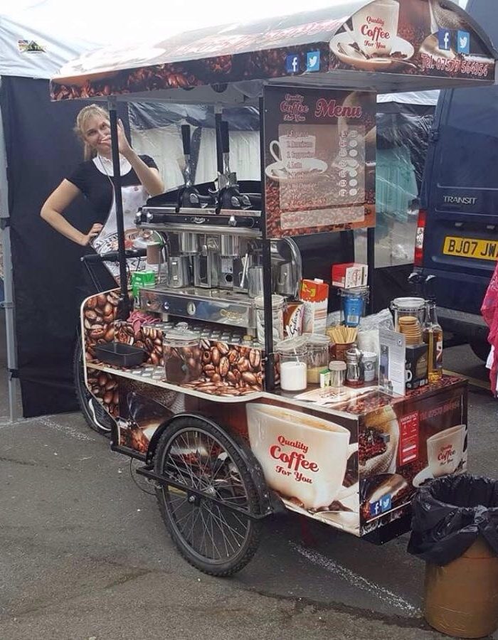 Quality Coffee For You mobile coffee bike at a Market in 2017.